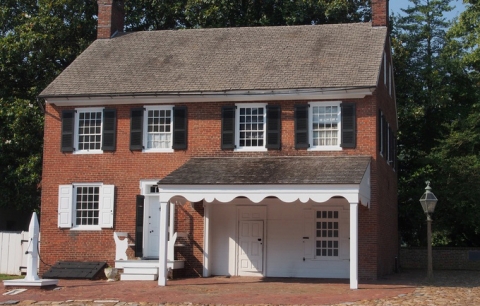 The wood water pump in front of the Historic Pump House c.1780